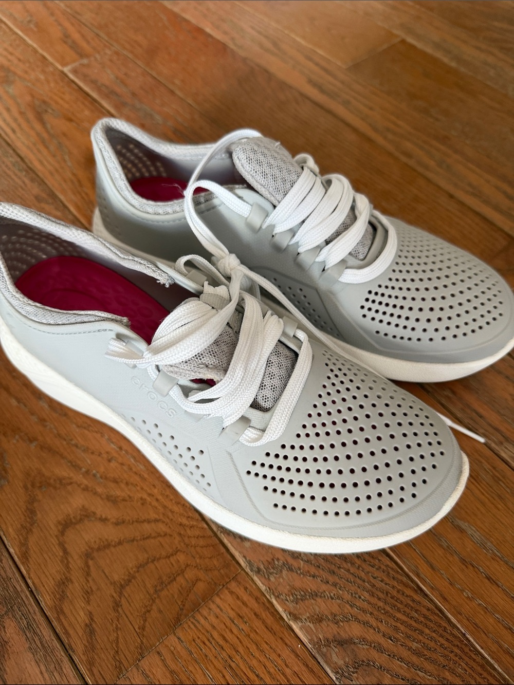 CROCS Women's Perforated Lace-Up Water Sneakers in Light Gray with Pink Insoles